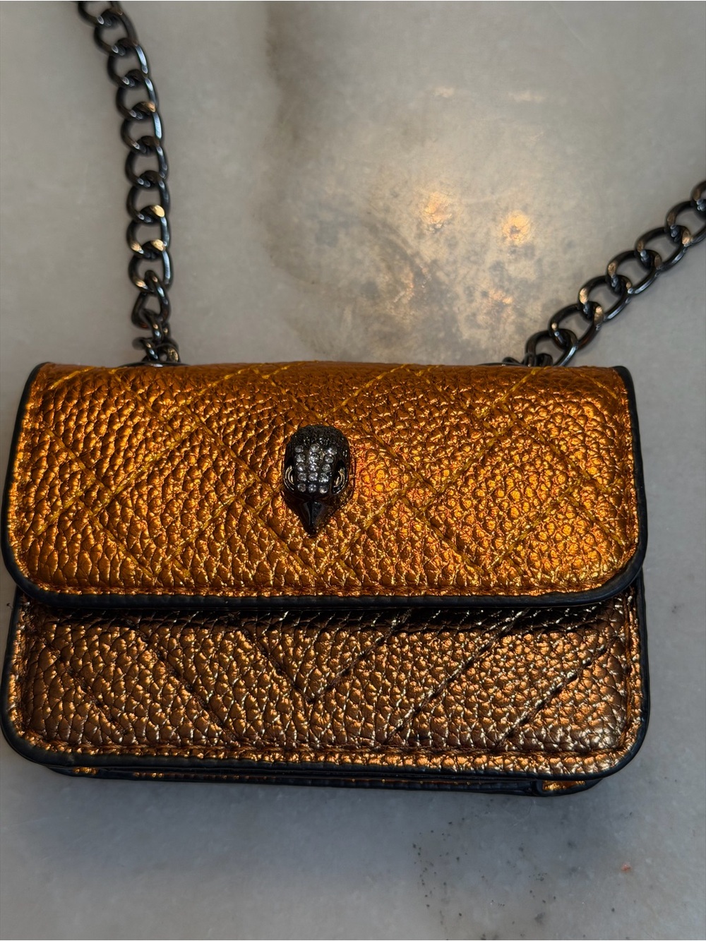 Kurt Geiger Metallic Bronze Mini Crossbody with Chain and Skull Accent